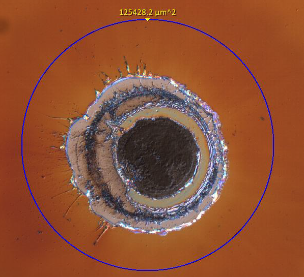 Figure 1: Image of laser-induced component failure, which can be initiated by thermal buildup from absorption